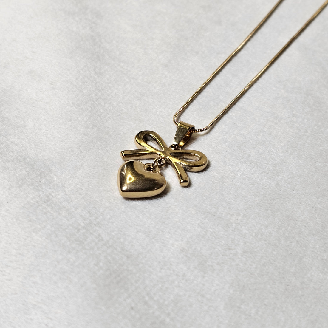 Gold Bow Heart Pendant